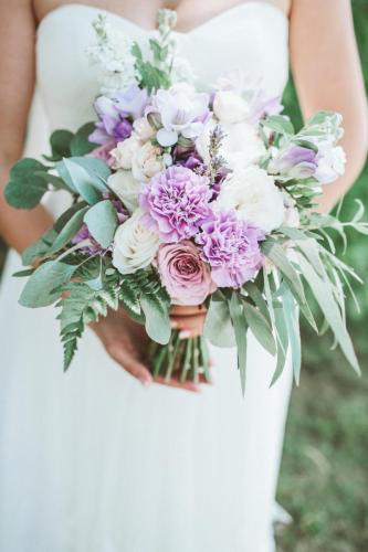 Beauty wedding bouquet in bride's hands