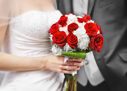 Bride and groom with bridal bouquet